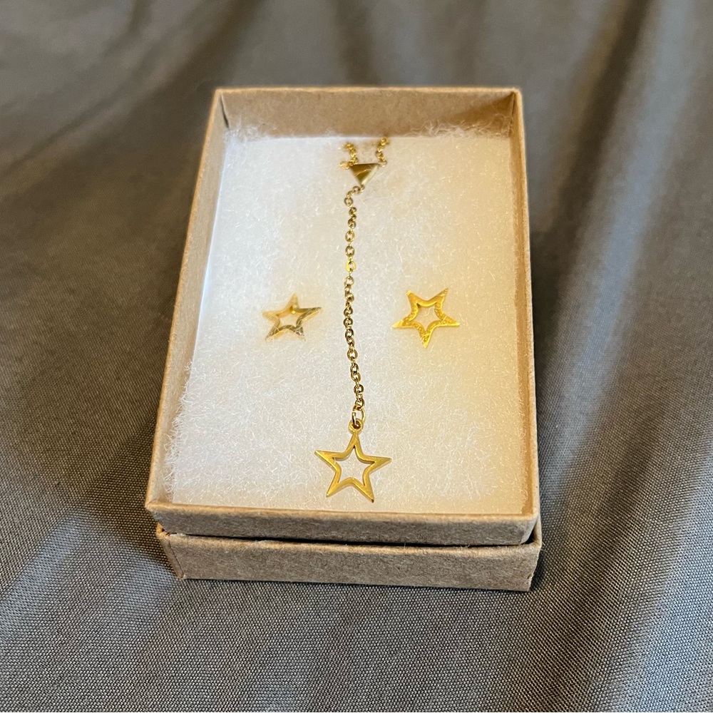 gold star earring studs and necklace